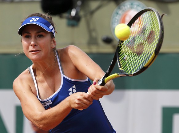 Madison Keys of the U.S. plays a shot to Belinda Bencic of Switzerland during their women&#039;s singles match at the French Open tennis tournament at the Roland Garros stadium in Paris, France, May 2 ...