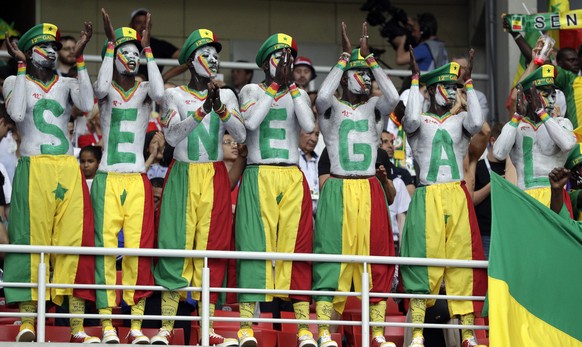 Senegal&#039;s fans support their team during the group H match between Poland and Senegal at the 2018 soccer World Cup in the Spartak Stadium in Moscow, Russia, Tuesday, June 19, 2018. (AP Photo/Andr ...