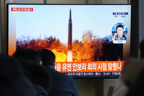People watch a TV showing a file image of North Korea&#039;s missile launch during a news program at the Seoul Railway Station in Seoul, South Korea, Tuesday, Jan. 11, 2022. North Korea on Tuesday fir ...