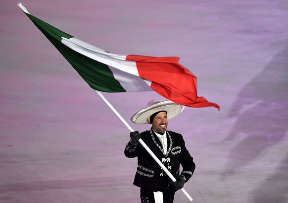 epa06508173 The flagbearer of Mexico, German Madrazo, arrives during the Opening Ceremony of the PyeongChang 2018 Olympic Games at the Olympic Stadium, Pyeongchang county, South Korea, 09 February 201 ...