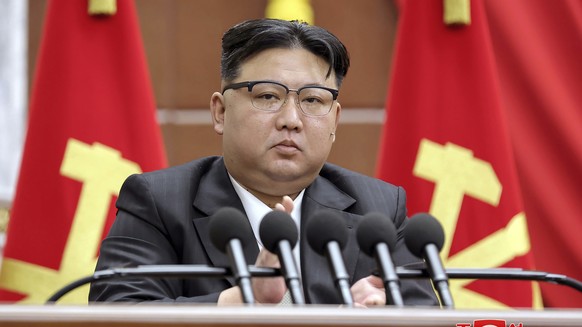In this photo provided by the North Korean government, North Korean leader Kim Jong Un delivers a speech at an end-of-year plenary meeting of the ruling Workers?  Party, which was held between December 26,…