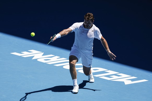epa11070505 Stan Wawrinka of the Switzerland in action during a practice session ahead of the Australian Open 2024, at Melbourne Park in Melbourne, Australia, 12 January 2024. EPA/MAST IRHAM