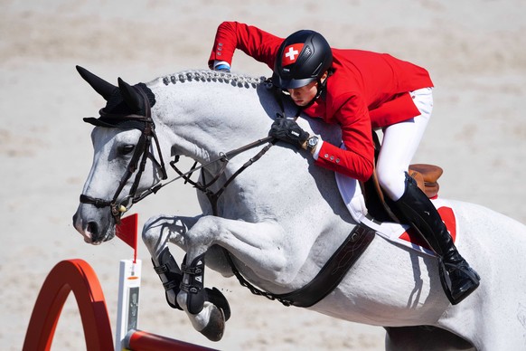 epa07792663 Martin Fuchs from Switzerland with Clooney 51 in action during the individual final day at the FEI European Jumping Championships in Rotterdam, The Netherlands, 25 August 2019. EPA/OLAF KR ...