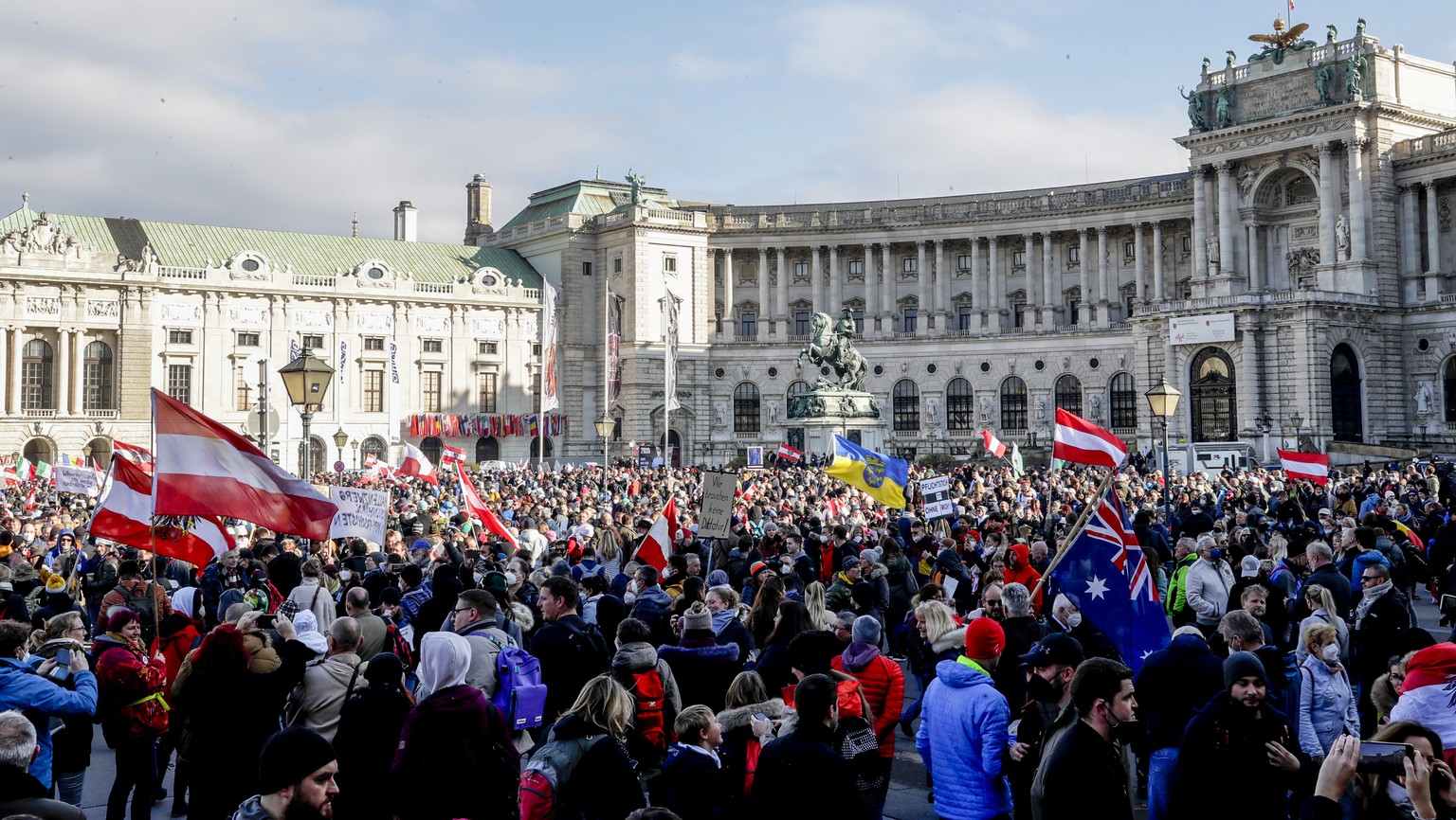 CORRECTS DATE - People take part in a demonstration against the country's coronavirus restrictions in Vienna, Austria, Saturday, Nov.20, 2021. Thousands of protesters are expected to gather in Vienna  ...