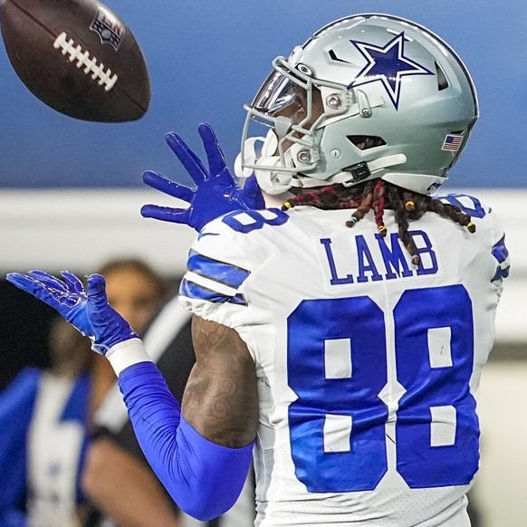 Dallas Cowboys&#039; CeeDee Lamb catches a touchdown pass during the first half of an NFL football game against the Philadelphia Eagles Saturday, Dec. 24, 2022, in Arlington, Texas. (AP Photo/Tony Gut ...