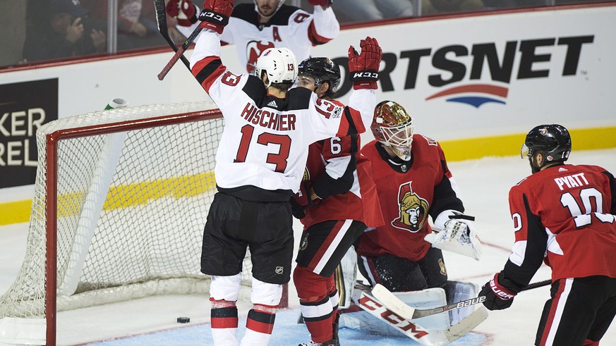 New Jersey Devils&#039; Nico Hischier, of Switzerland, reacts after scoring on Ottawa Senators Mike Condon during the first period of an NHL preseason hockey game in Summerside, Prince Edward Island,  ...