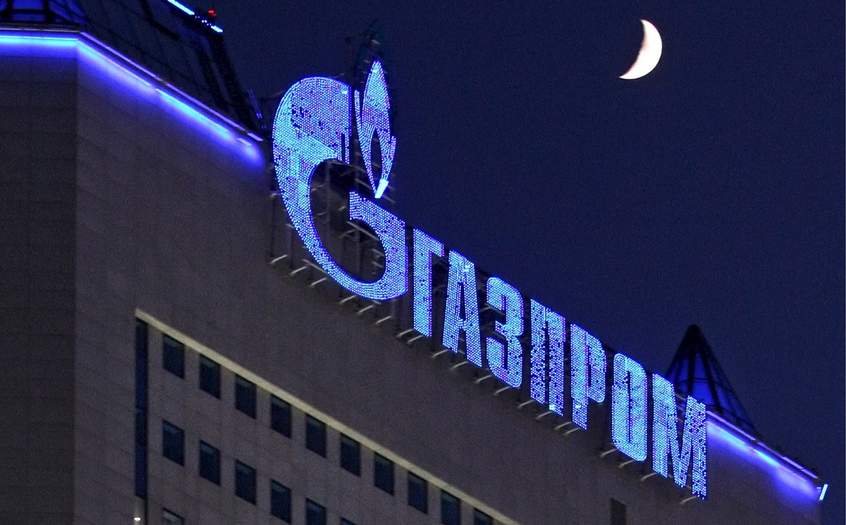 epa09792292 (FILE) - The logo of Russian gas company Gazprom illuminated on Gazprom headquarters in Moscow, Russia, 02 January 2009 (re-issued on 28 February 2022). The European football governing bod ...