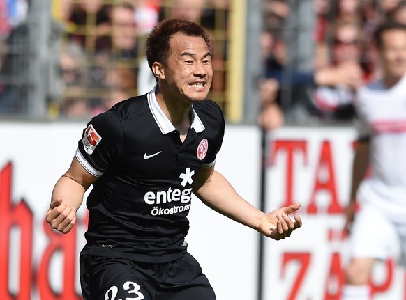 FREIBURG GERMANY - APRIL 18: Shinji Okazaki of 1. FSV Mainz 05 celebrates his opening goal during the Bundesliga match between Sport Club Freiburg and 1. FSV Mainz 05 at Schwarzwald-Stadium on April 1 ...