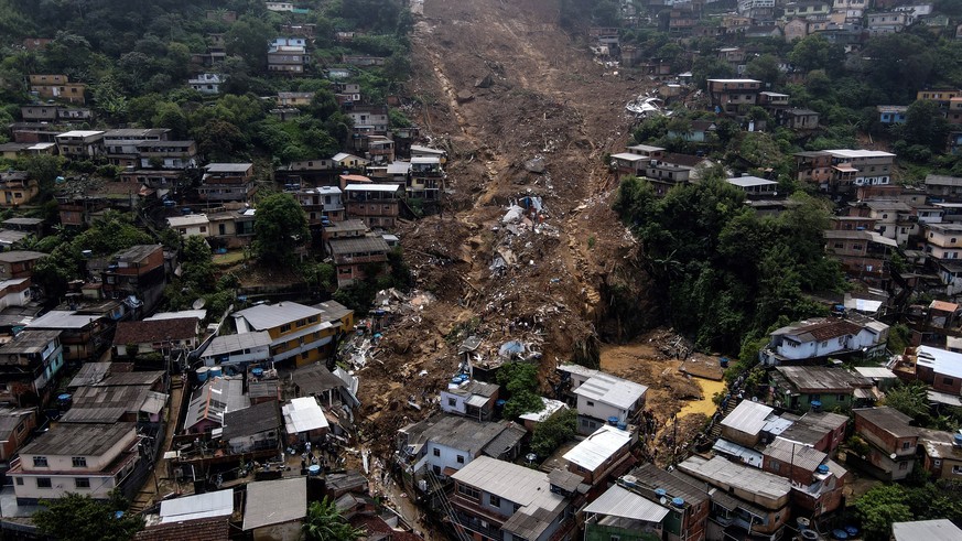 epa09762696 An aerial view on the damage caused by the heavy rains that affect the city of Petropolis, RJ, Brazil, 16 February 2022. At least 38 people have died in Petropolis in floods following heav ...