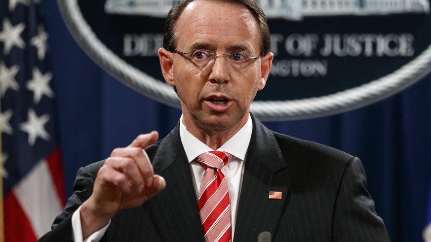 FILE - In this July 13, 2018, file photo, Deputy Attorney General Rod Rosenstein speaks during a news conference at the Department of Justice in Washington. Rosenstein is denying a report in The New Y ...