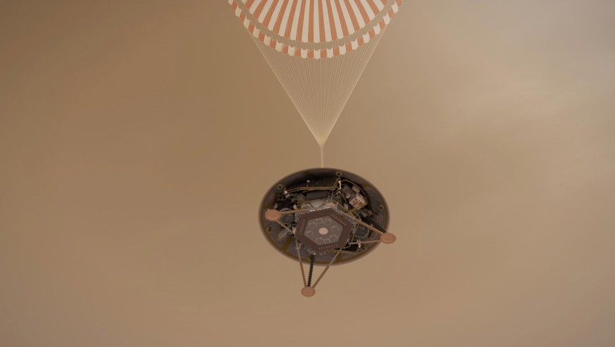 This illustration shows a simulated view of NASA&#039;s InSight lander descending towards the surface of Mars on its parachute.