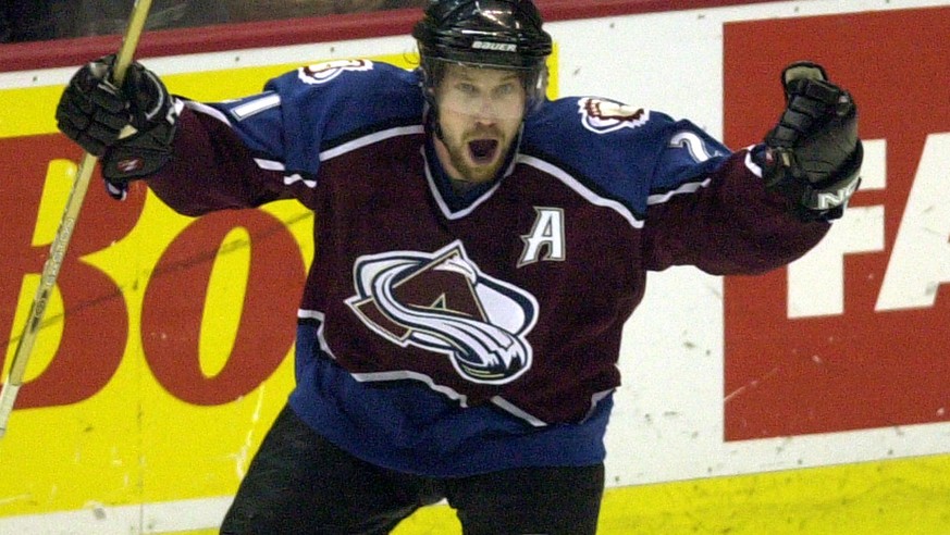 Colorado Avalanche center Peter Forsberg of Sweden celebrates his overtime goal to defeat the Detroit Red Wings in game 5 of the Western Conference finals in Detroit, Monday, May 27, 2002. (AP Photo/C ...