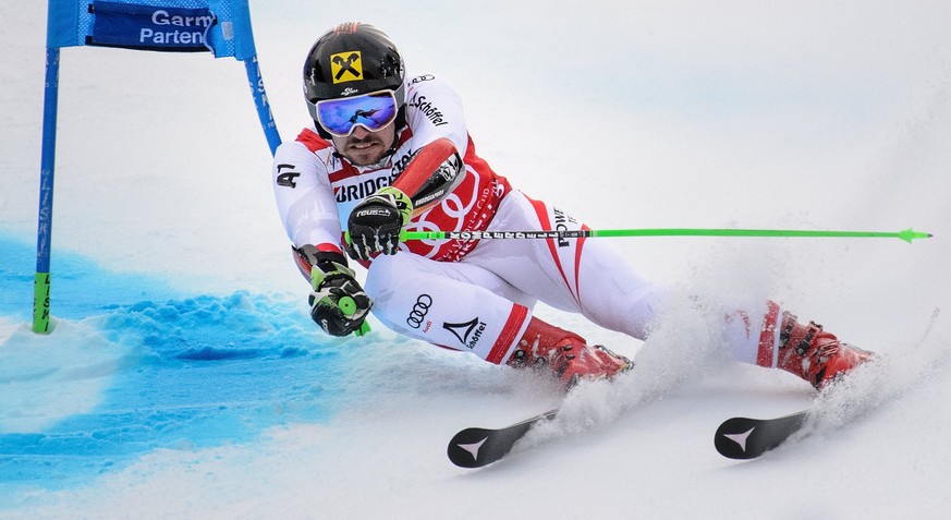 epa06480650 Marcel Hirscher of Austria speeds down the slope during the first run of the Men&#039;s Giant Slalom race of the FIS Alpine Skiing World Cup in Garmisch-Partenkirchen, Germany, 28 January  ...