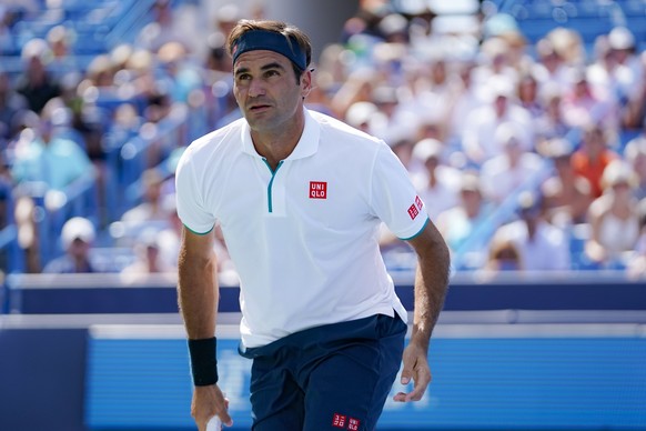 FILE - In this Aug. 15, 2019, file photo, Roger Federer, of Switzerland, reacts during a match against Andrey Rublev, of Russa, during the quarterfinals of the Western &amp; Southern Open tennis tourn ...