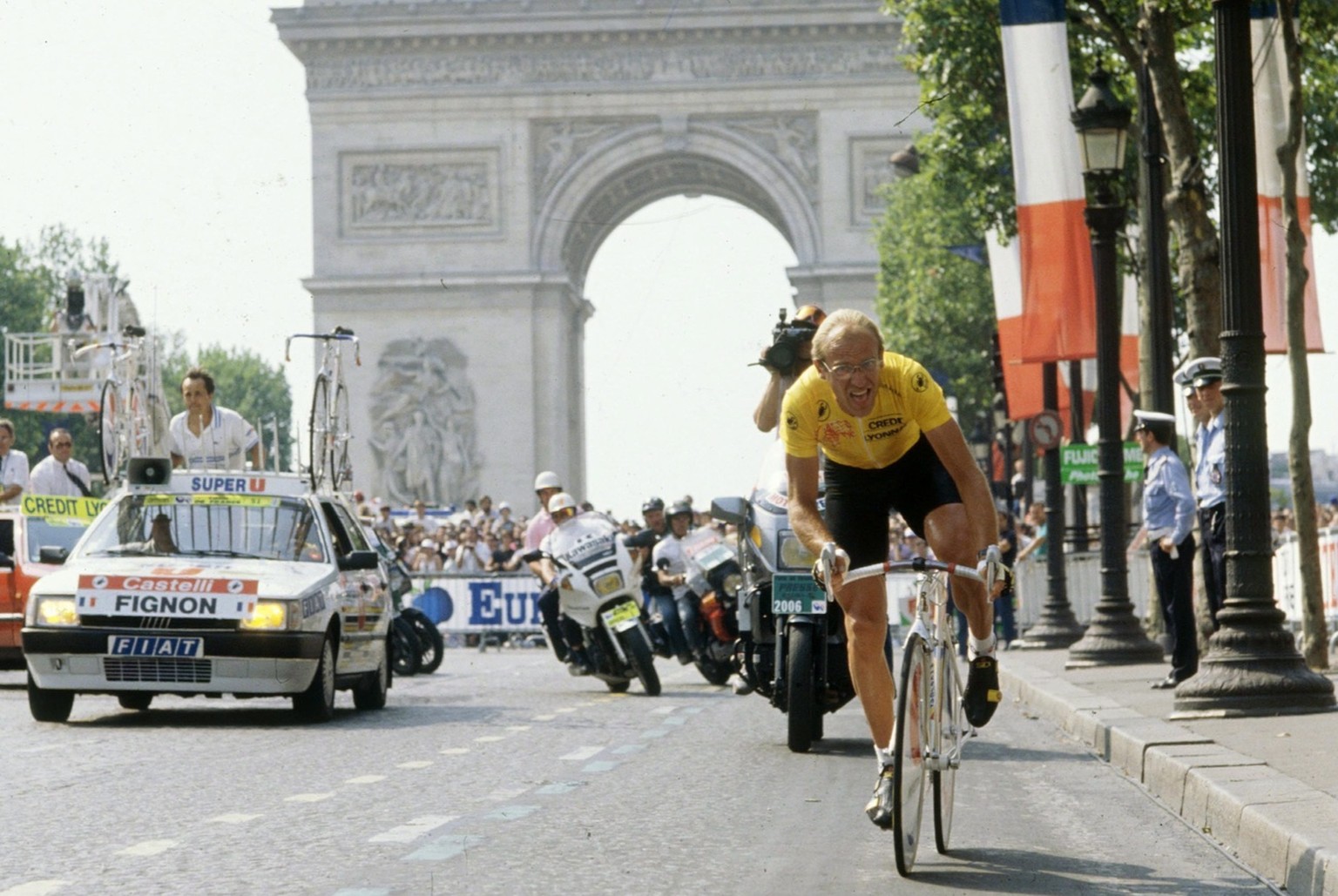 A photo dated 23 July 1989 shows French cyclist Laurent Fignon racing through the Champs Elysees, in Paris, at the end of the 1989 Tour de France. Two-time Tour de France winner Fignon has died at age ...