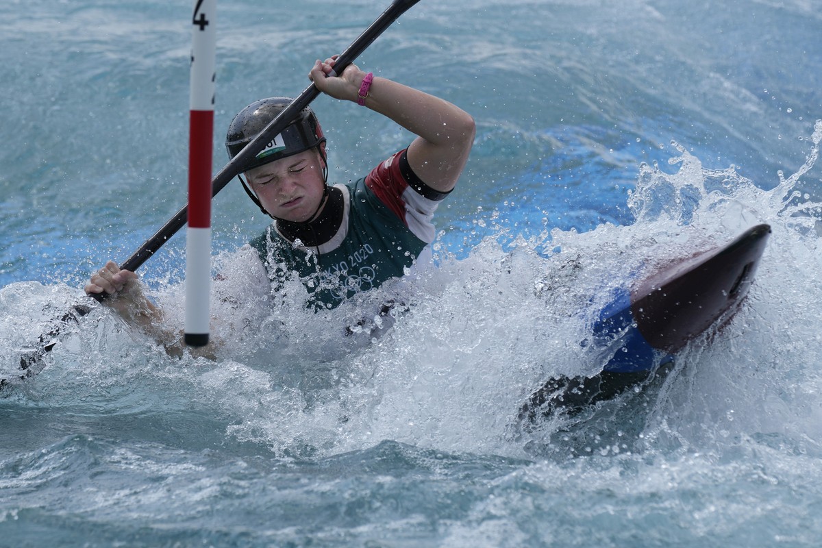 Naemi Braendle of Switzerland competes in the Women's K1 heats of the Canoe Slalom at the 2020 Summer Olympics, Sunday, July 25, 2021, in Tokyo, Japan. (AP Photo/Kirsty Wigglesworth)