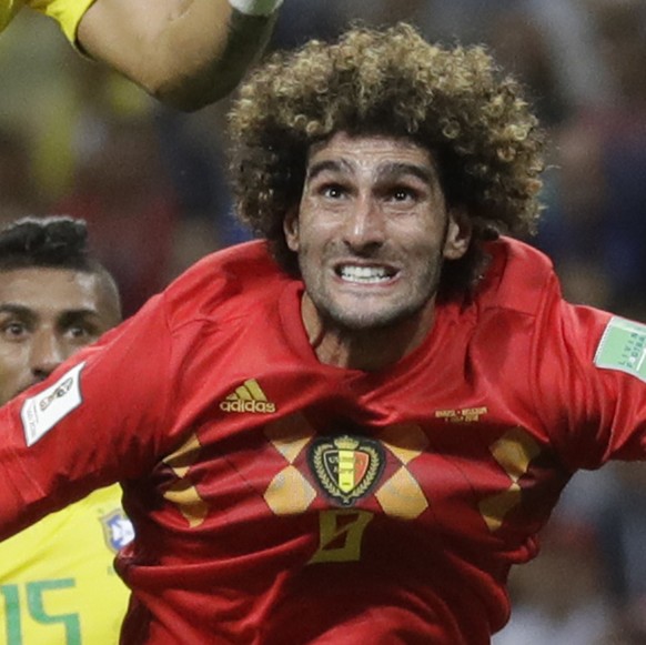 Brazil&#039;s Thiago Silva, left heads the ball under pressure from Belgium&#039;s Marouane Fellaini during the quarterfinal match between Brazil and Belgium at the 2018 soccer World Cup in the Kazan  ...