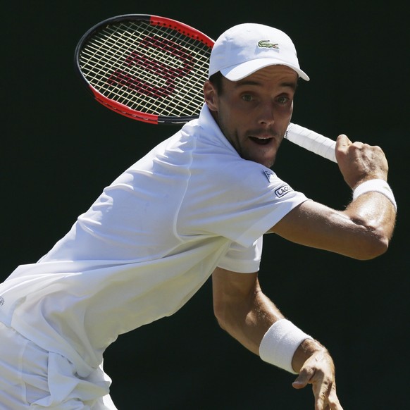 Spain&#039;s Roberto Bautista Agut returns to Germany&#039;s Peter Gojowczyk during their Men&#039;s Singles Match on day three at the Wimbledon Tennis Championships in London Wednesday, July 5, 2017. ...