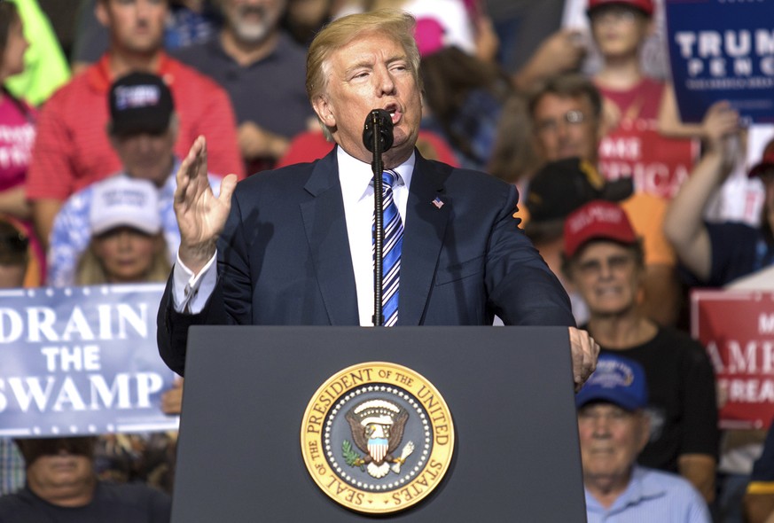 President Donald Trump speaks on Thursday, Aug. 3, 2017, at the Big Sandy Superstore Arena in Huntington, W.Va. (Evan Boggs /The Messenger-Inquirer via AP)