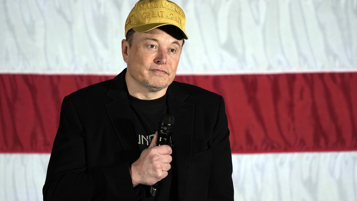 Elon Musk speaks as part of a campaign town hall in support of Republican presidential nominee former President Donald Trump in Folsom, Pa., Thursday, Oct. 17, 2024. (AP Photo/Matt Rourke)