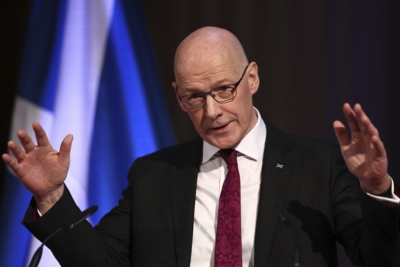 Scotland&#039;s First Minister John Swinney gestures during a speech to representatives from organisations across the public and private sector at Playfair Library in Edinburgh, Scotland, Monday, Jan. ...