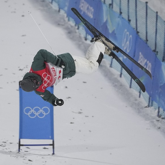 Switzerland&#039;s Marco Tade competes in the men&#039;s moguls qualifying at Genting Snow Park at the 2022 Winter Olympics, Thursday, Feb. 3, 2022, in Zhangjiakou, China. (AP Photo/Gregory Bull)