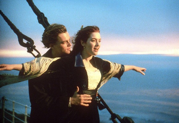 Actors Leonardo DiCaprio (L) and Kate Winslet (R) in a scene from the movie &quot;Titanic&quot; which was nominated for a record-tying 14 Academy Awards 10 February. Among the nominations &quot;Titani ...