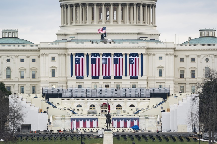 epa08944915 The US Capitol is seen ahead of President-elect Joe Biden's inauguration from the National Mall in Washington, DC, USA, 17 January 2021. Biden will be sworn-in as the 46th president o ...