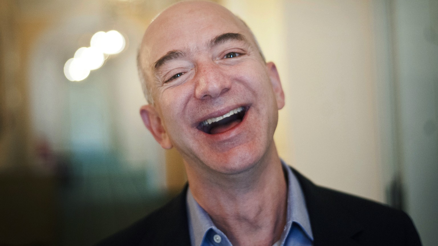 epa07353115 (FILE) - US entrepreneur, founder and president of internet company Amazon, Jeff Bezos smiles at the Bayerischer Hof in Munich, Germany, 11 October 2012 (reissued on 08 February 2019). Acc ...