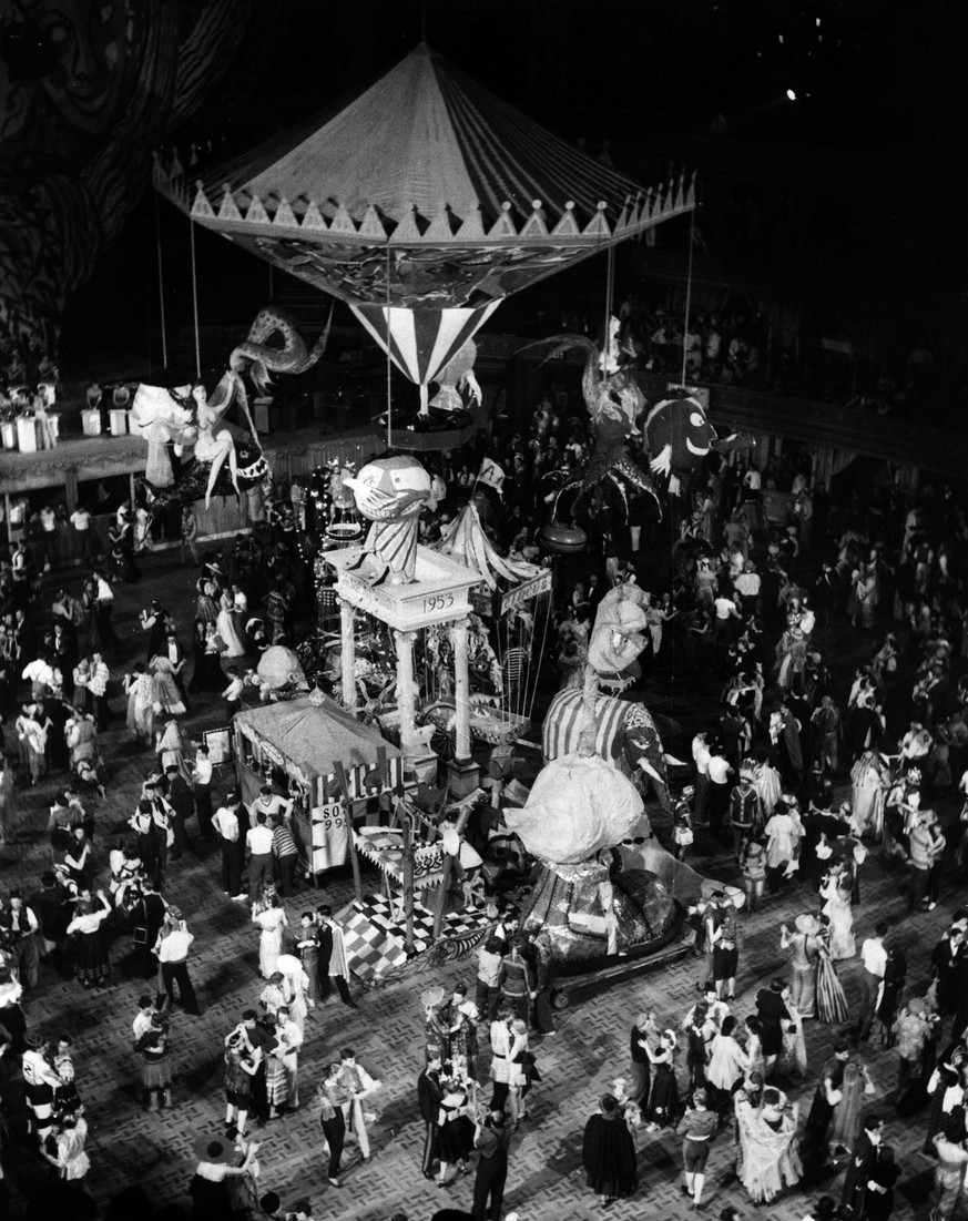 circa 1954: Dancers and merrymakers at the Chelsea Arts Ball held at the Royal Albert Hall, where the theme to welcome in the New Year was fun. (Photo by Fox Photos/Getty Images)