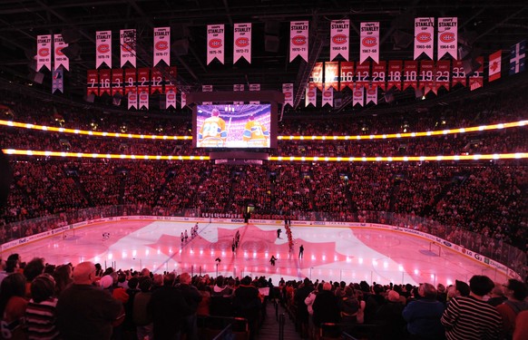 Feb 28, 2015; Montreal, Quebec, CAN; General view during the Canadian national anthem before the game between the Toronto Maple Leafs and the Montreal Canadiens at the Bell Centre. Mandatory Credit: E ...