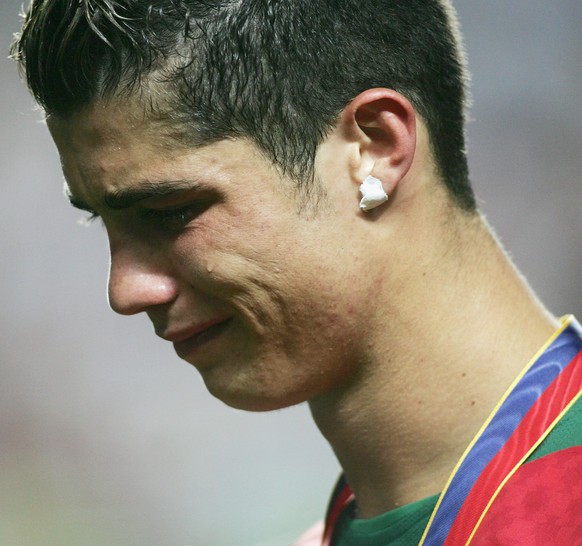 LISBON, PORTUGAL - JULY 4: Cristiano Ronaldo of Portugal in tears after the UEFA Euro 2004, Final match between Portugal and Greece at the Luz Stadium on July 4, 2004 in Lisbon, Portugal. (Photo by Be ...