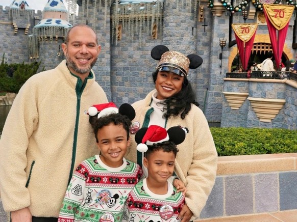 Tatyana Ali and Vaughn Rasberry with their two sons at Disneyland