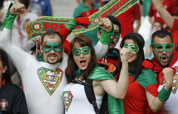 Portugal&#039;s fans cheer as they wait for the start of the Euro 2016 quarterfinal soccer match between Poland and Portugal, at the Velodrome stadium in Marseille, France, Thursday, June 30, 2016. (A ...