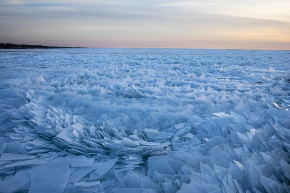 Shards of ice pile up on Lake Michigan along the South Haven Pier in South Haven, Mich., on Tuesday, March 19, 2019. (Joel Bissell/Kalamazoo Gazette via AP)