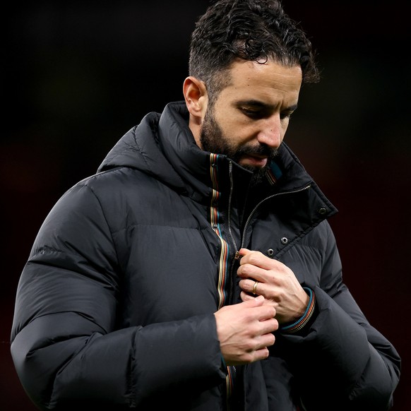 epa11799434 Manchester United manager Ruben Amorim walks off the pitch after the English Premier League match between Manchester United and Newcastle United in Manchester, Britain, 30 December 2024. E ...