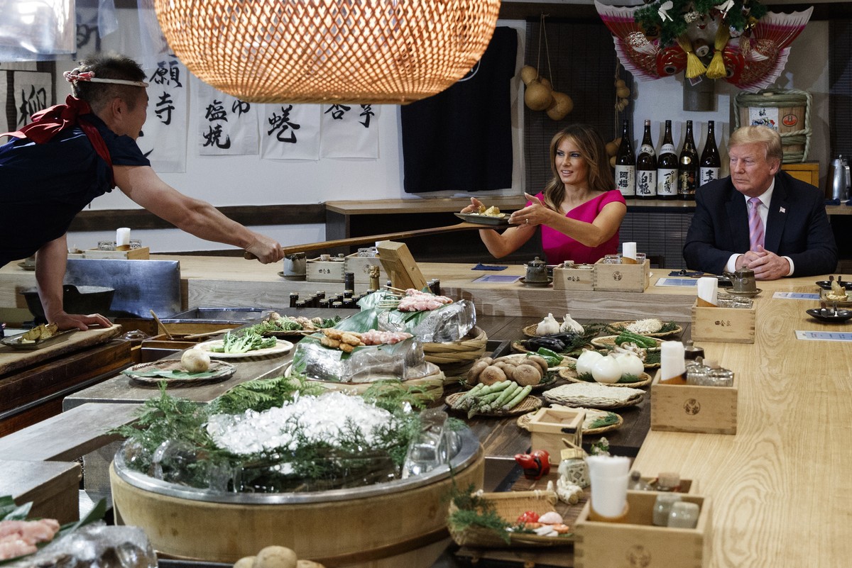 President Donald Trump and first lady Melania Trump have dinner with Japanese Prime Minister Shinzo Abe and his wife Akie Abe, Sunday, May 26, 2019, in Tokyo. (AP Photo/Evan Vucci)