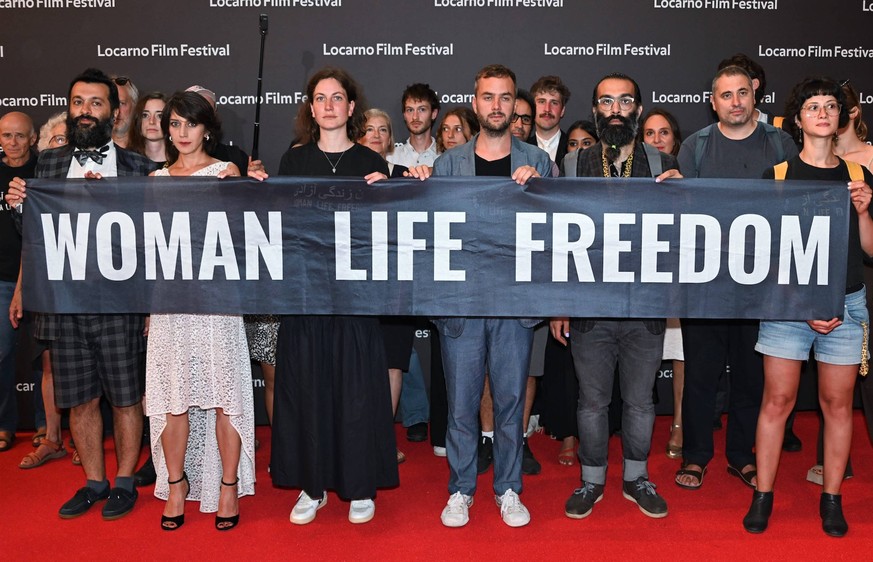 Locarno,Swiss Locarno Film Festival 2023 Red carpet photocall Award 2023 photocall Golden Leopard 2023 best film Mantagheye bohrani Critical Zone by Ali Ahmadzadeh during the closing evening of the fe ...
