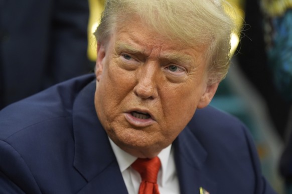 President Donald Trump answers questions from reporters as he meets with Congo&#039;s Foreign Minister Therese Kayikwamba Wagner, and Rwanda&#039;s Foreign Minister Olivier Nduhungirehe, Friday, June  ...