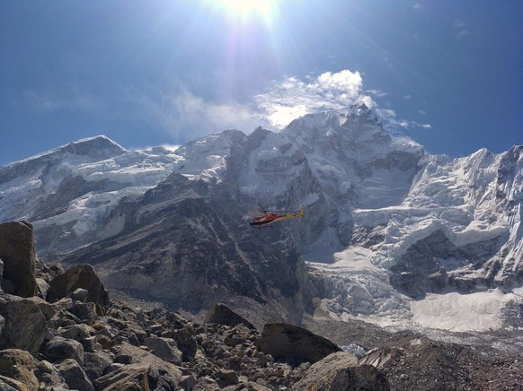 Everest Base Camp, Nepal - May 16th, 2019 Rescue Helicopter in the Everest Base Camp, Everest Base Camp, Nepal - May 16th, 2019 Rescue Helicopter in the Everest Base Camp EBC