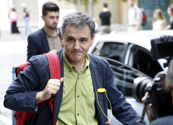 FILE - This is a Sunday, June 28, 2015 file photo of Greece&#039;s Deputy Foreign Minister for international economic relations, Euclid Tsakalotos, as arrives at the Finance Ministry in Athens. Follow ...