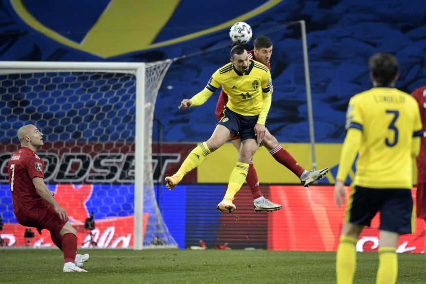 Sweden&#039;s Zlatan Ibrahimovic, front center, and Georgia&#039;s Lasha Dvali battle for the ball during World Cup 2022 qualifier group A soccer game between Sweden and Georgia at Friends Arena in St ...