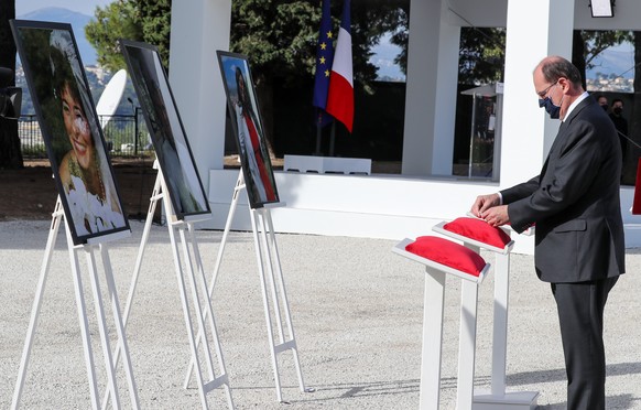 epa08804129 French Prime Minister Jean Castex attends a ceremony for the victims of the recent attack at Notre-Dame de Nice Basilica, in Nice, France, 07 November 2020. Three people were killed on 29  ...