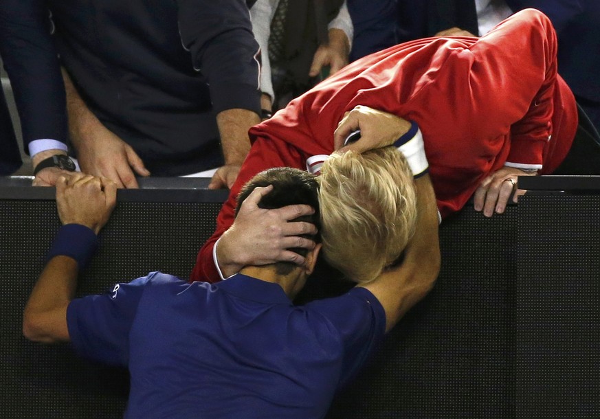 Serbia&#039;s Novak Djokovic (L) celebrates with his coach Boris Becker after winning his final match against Britain&#039;s Andy Murray at the Australian Open tennis tournament at Melbourne Park, Aus ...