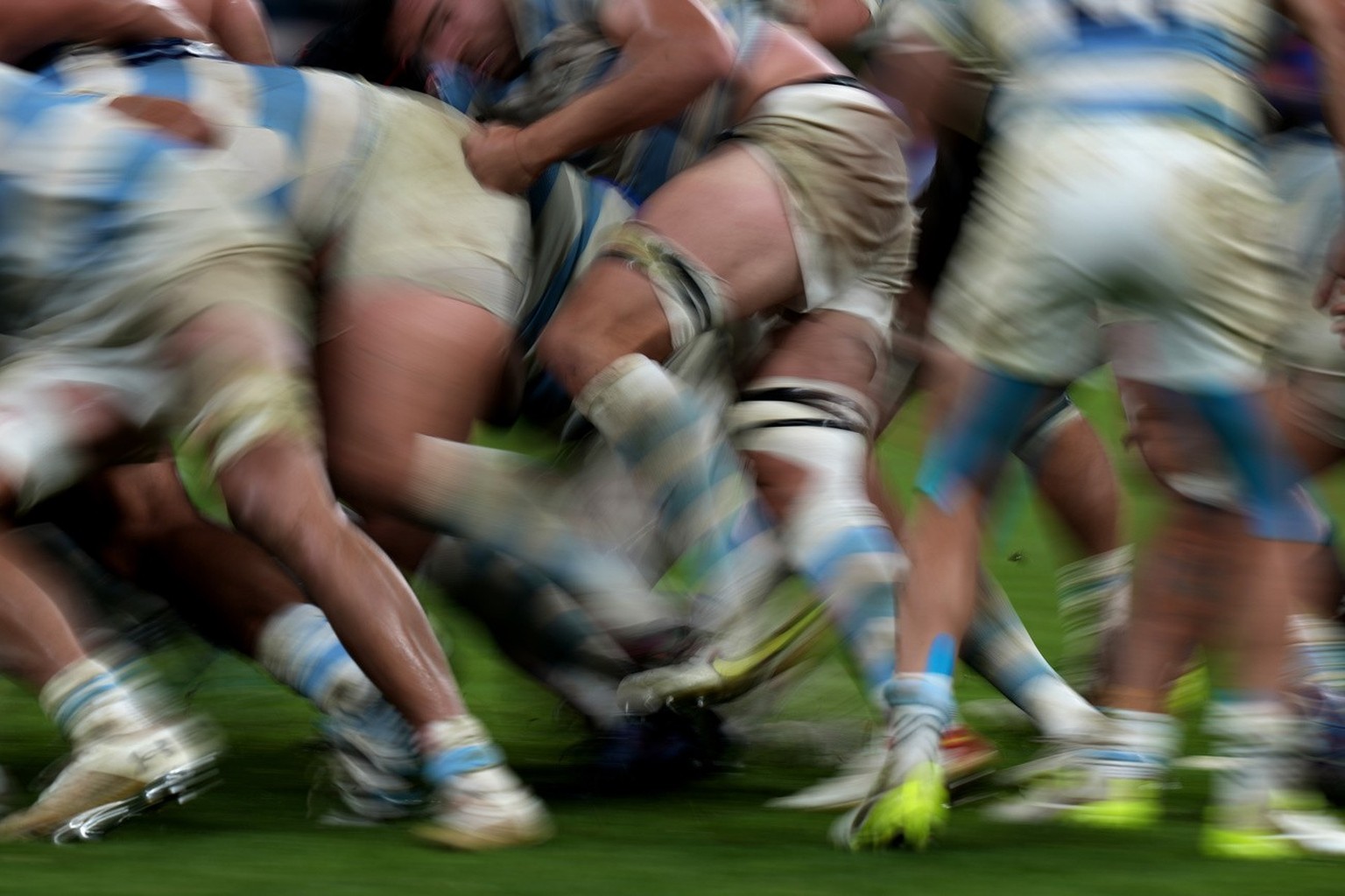 In this picture taken by slow shutter speed, players of Argentina scrum during the Rugby World Cup semifinal match between Argentina and New Zealand at the Stade de France in Saint-Denis, outside Pari ...