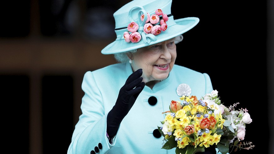 FILE - In this April 16, 2017, file photo, Britain&#039;s Queen Elizabeth leaves the Easter Sunday service in Windsor Castle, in Windsor England. The AP reported on Dec. 8, 2017, that a story claiming ...