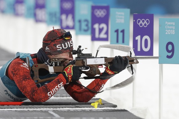 Serafin Wiestner, of Switzerland, shoots from the prone position during the men&#039;s 10-kilometer biathlon sprint at the 2018 Winter Olympics in Pyeongchang, South Korea, Sunday, Feb. 11, 2018. (AP  ...