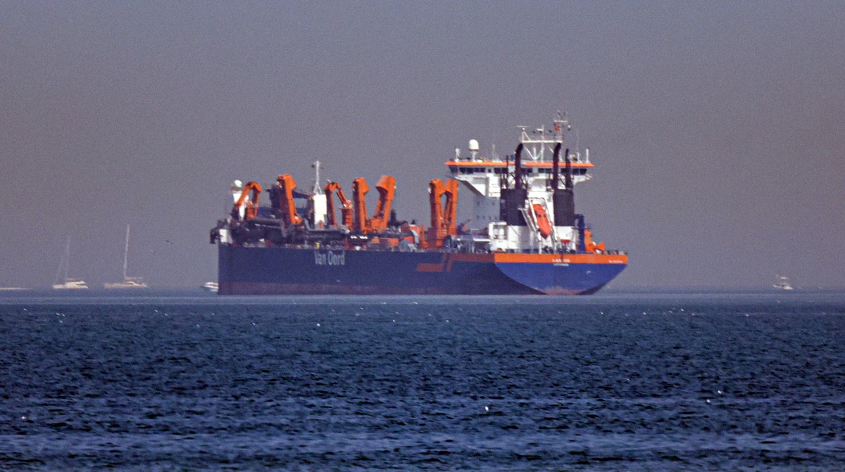 epa12787005 A vessel is seen anchoring off the coast of Dubai, United Arab Emirates, 01 March 2026. Following a joint Israel-US military operation targeting multiple locations across Iran in the early ...