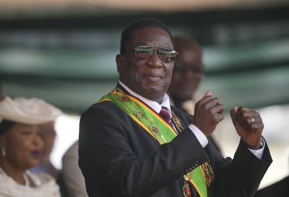 Zimbabwe President Emmerson Mnangagwa gestures during his inauguration ceremony at the National Sports Stadium in the capital, Harare, Monday, Sept. 4 2023. Mnangagwa won a second and final-five year  ...