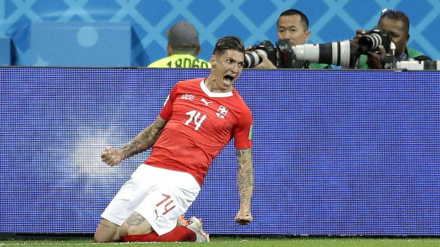 Switzerland&#039;s Steven Zuber celebrates after scoring during the group E match between Brazil and Switzerland at the 2018 soccer World Cup in the Rostov Arena in Rostov-on-Don, Russia, Sunday, June ...